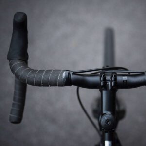 A close up of the handlebar on a bicycle